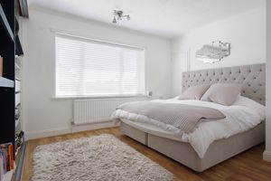 Bedroom One- click for photo gallery